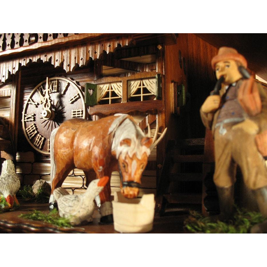 Rombach & Haas (Romba) Model 8393 FARMER COUPLE 8-Day Black Forest Cuckoo Clock with Intricately Carved Animated Figures, Chalet Style