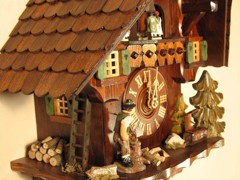 Cuckoo Clock - Rombach & Haas (Romba) WOODCHOPPER Model 8362, 8-Day Black Forest Cuckoo Clock, Chalet Style With Music Box And Dancers