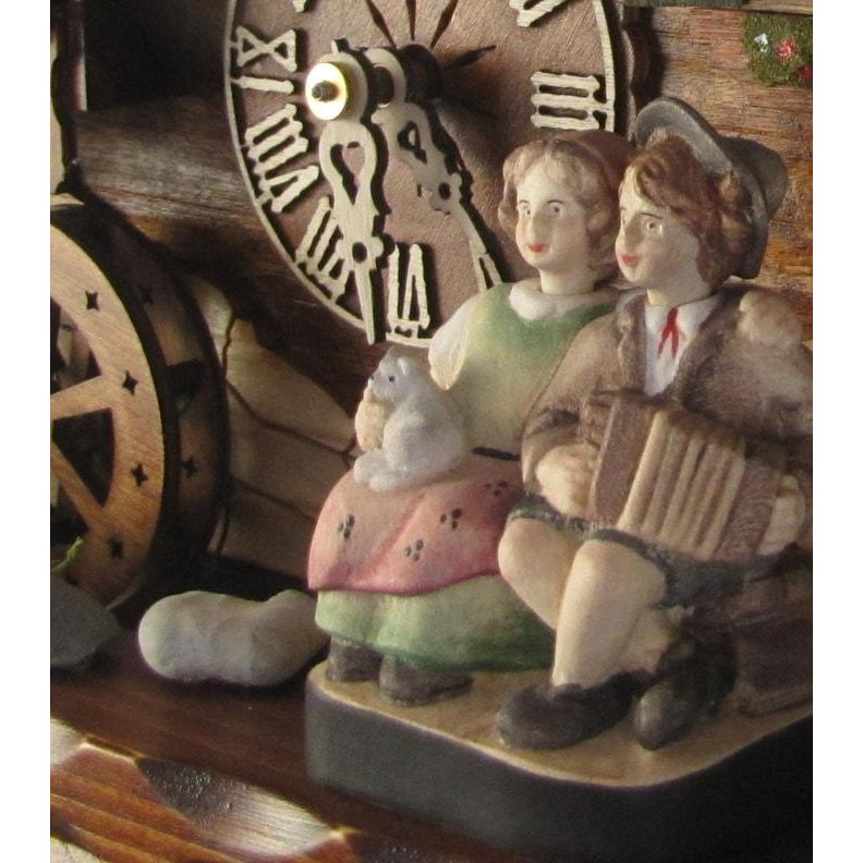 Sternreiter Kissing Couple Black Forest Mechanical Musical Cuckoo Clock #1392 with Swiss chalet, Animated Figurines and Waterwheel