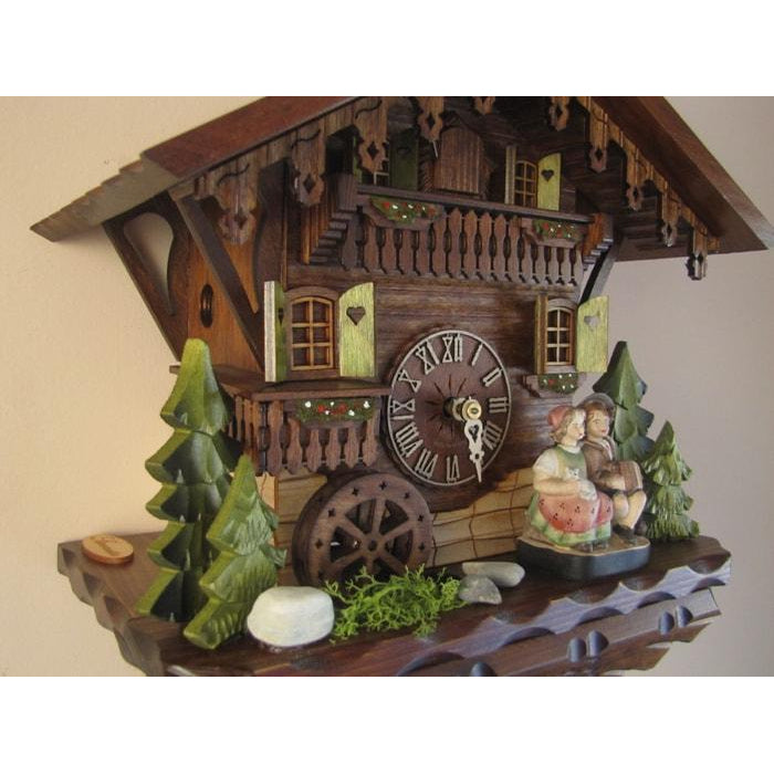 Sternreiter Kissing Couple Black Forest Mechanical Musical Cuckoo Clock #1392 with Swiss chalet, Animated Figurines and Waterwheel