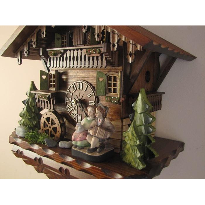 Sternreiter Kissing Couple Black Forest Mechanical Musical Cuckoo Clock #1392 with Swiss chalet, Animated Figurines and Waterwheel