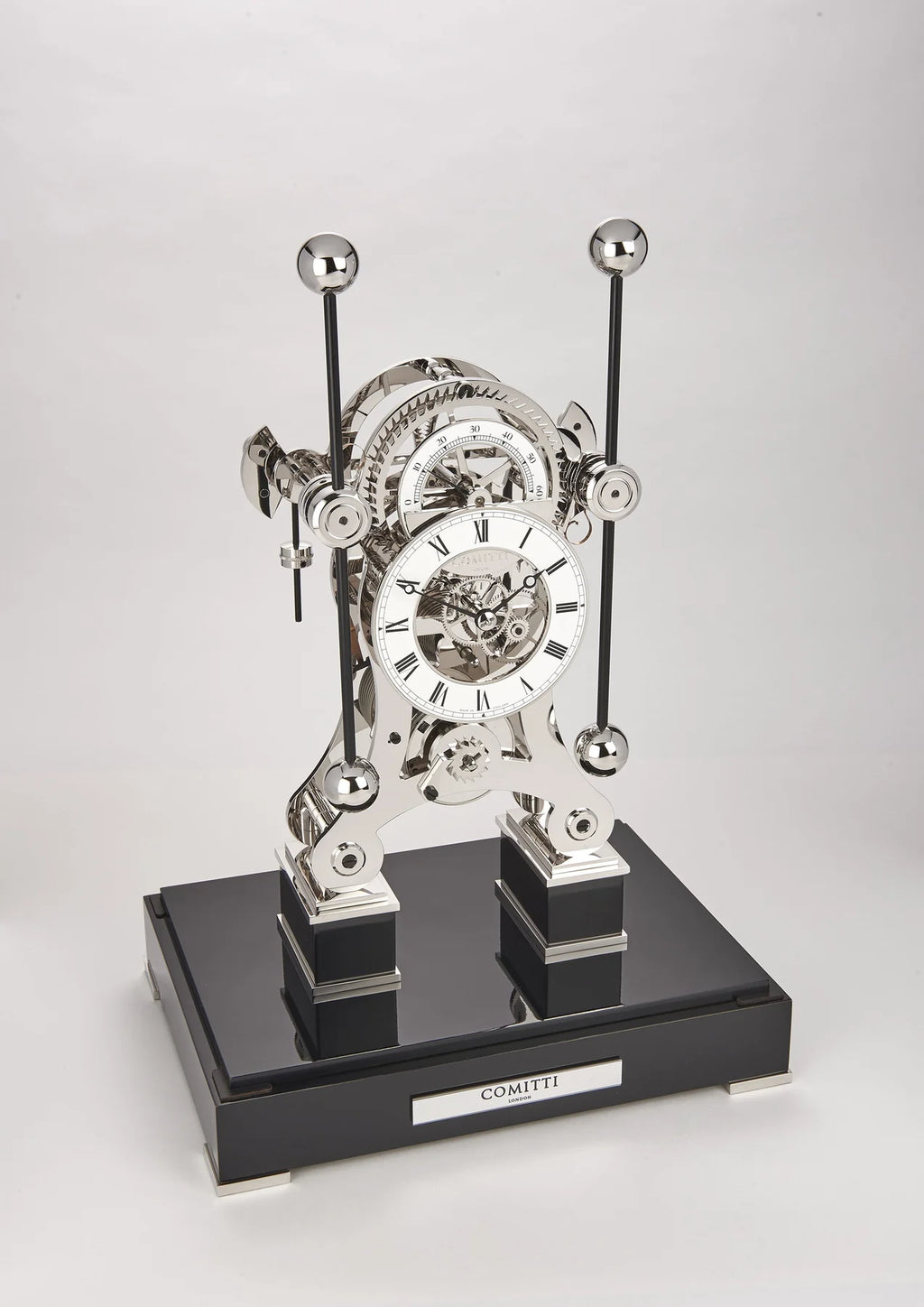 Comitti  Navigator  S5676S Table Clock, Rhodium Plated Fusee Mechanism with Gloss Lacquered Carbon Fiber Base Base