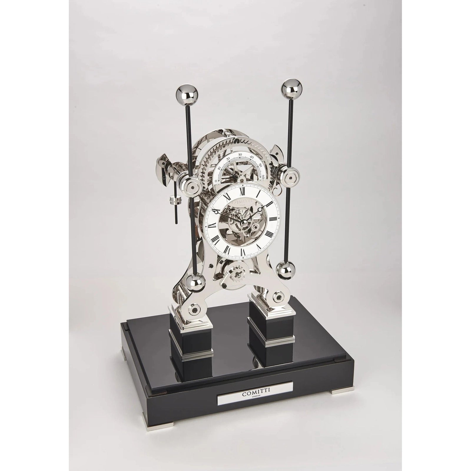 Comitti  Navigator  S5676S Table Clock, Rhodium Plated Fusee Mechanism with Gloss Lacquered Carbon Fiber Base Base
