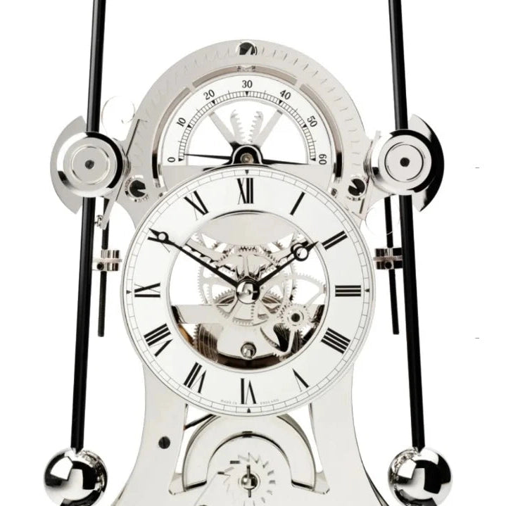 Comitti  Navigator  S5676S Table Clock, Rhodium Plated Fusee Mechanism with Gloss Lacquered Carbon Fiber Base Base