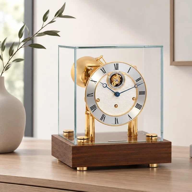 Hermle Hampton walnut and brass mechanical desk clock in room setting
