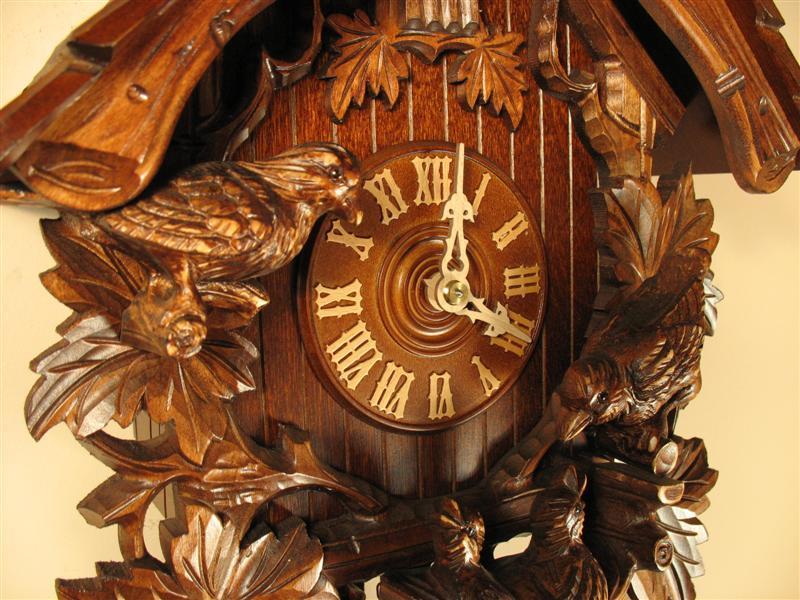 Cuckoo Clock - Rombach & Haas (Romba) FEEDING BIRDS Model 8207 8-Day Black Forest Cuckoo Clock With Half And Full Hour Call And Detailed Carvings