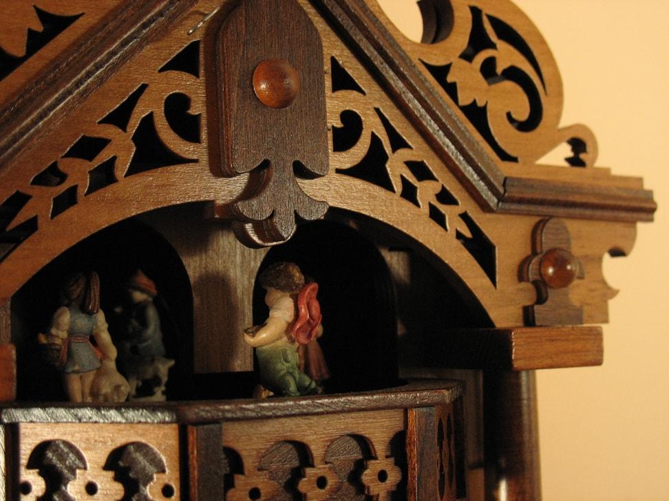 Cuckoo Clock - Rombach & Haas (Romba) FRETWORK Model 8364 8-DAY Black Forest Cuckoo Clock With Music Box, Animated Figures And Intricate Details